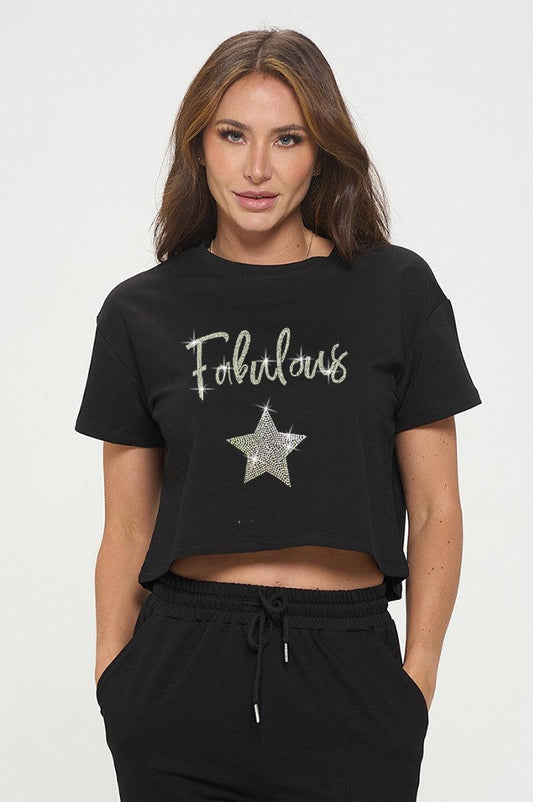  In2You Fabulous Crop Top featuring a trendy cropped design with a sleek fit. This top adds a touch of sass with its bold style, perfect for pairing with high-waisted jeans or skirts for a fun and fashionable look.