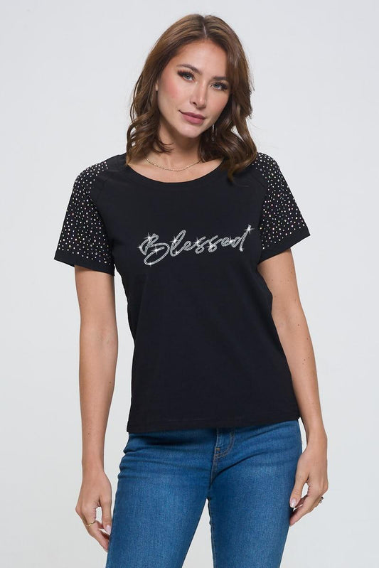 In2You short sleeve rhinestone graphic top featuring sparkling rhinestone details, available in Black, White, or Purple. True-to-size fit for a comfortable and stylish look, perfect for adding a touch of glam to any casual outfit.